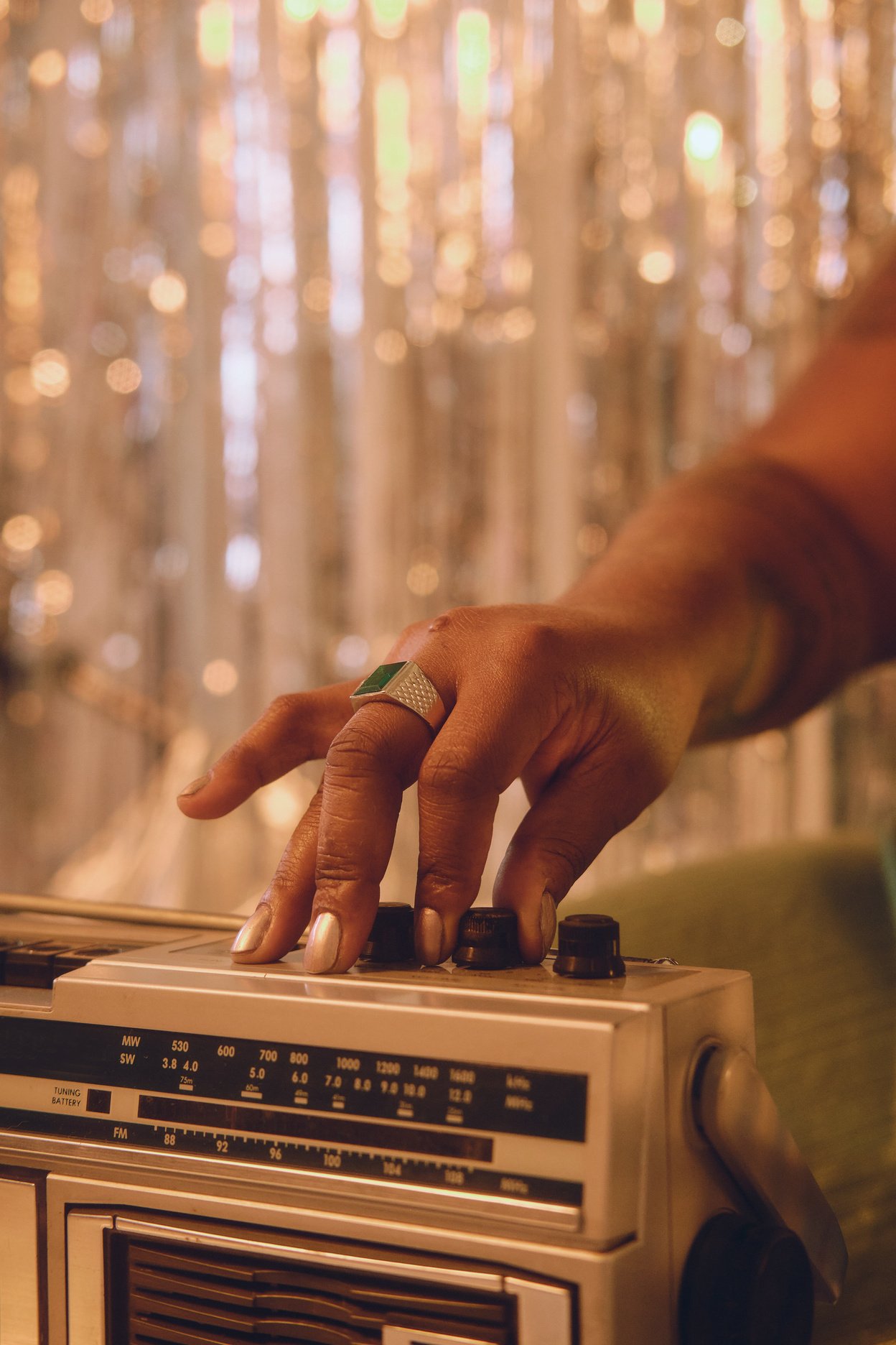 Woman Switching Channels on Radio